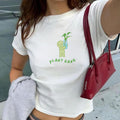 Cute Smiski Baby Tee Trendy Y2K 90s Cropped Shirt Plant Lover Gift Homebody Club Graphic Japanese Streetwear Kewpie Sonny Angel Green Guy